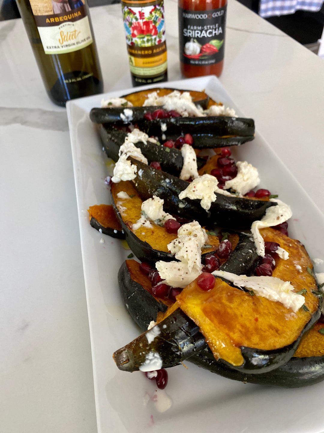 Roasted Acorn Squash with Pomegranate and Burrata